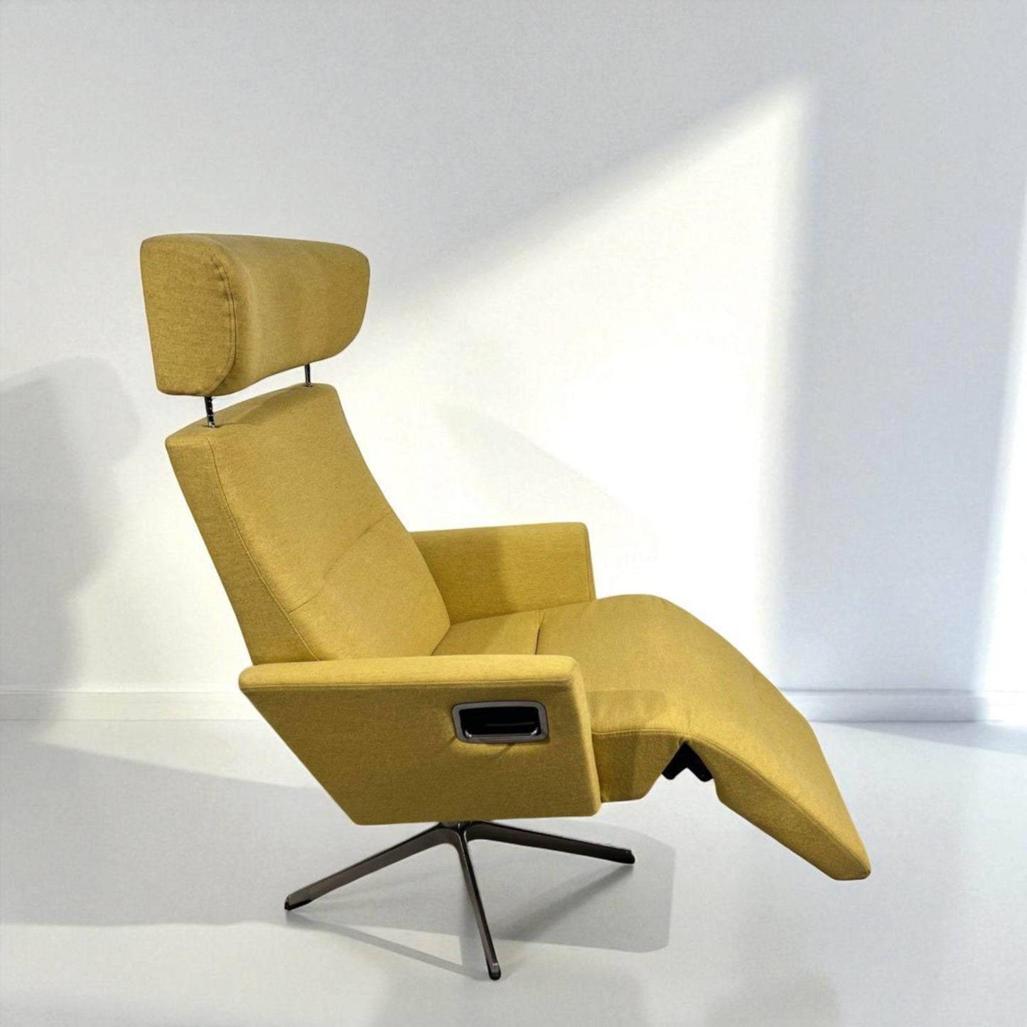 Eksklusiv Conform Relieve Recliner med innbygd fothviler