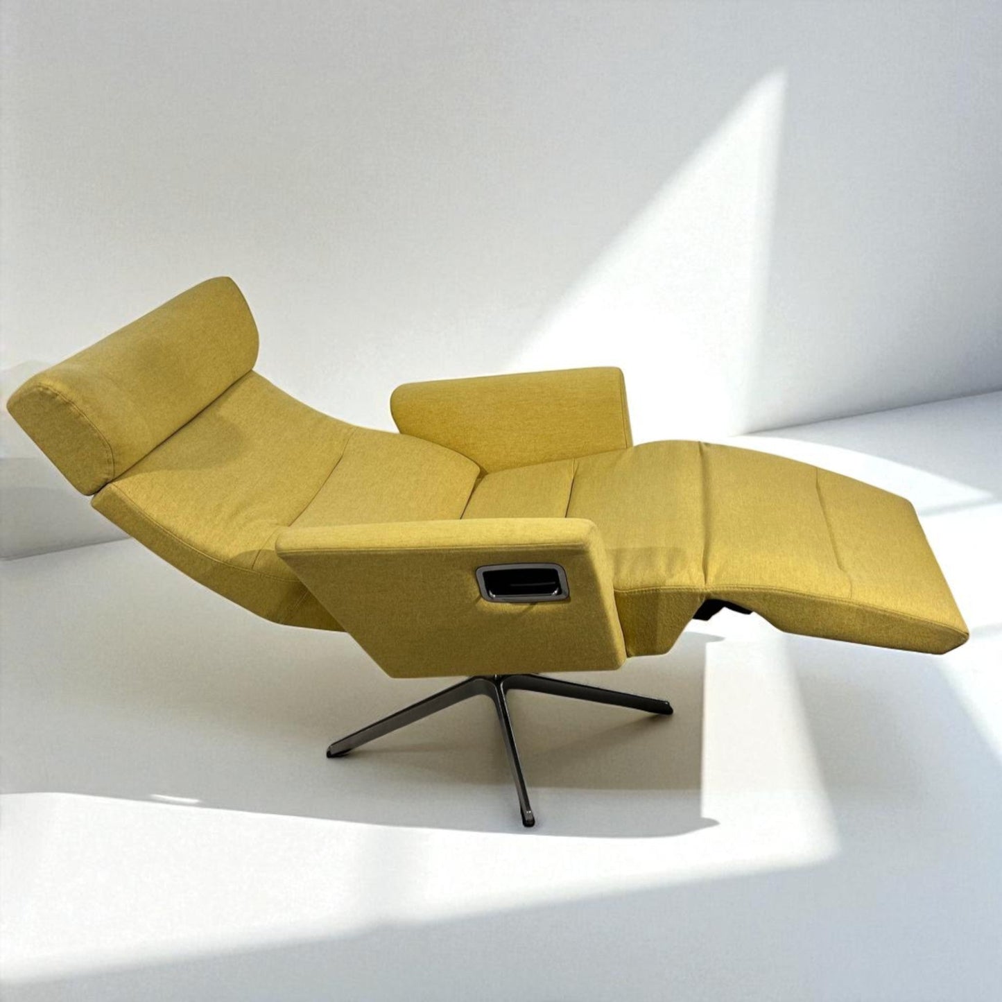 Eksklusiv Conform Relieve Recliner med innbygd fothviler