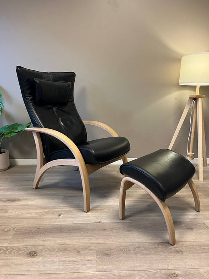 Brunstad Delta Adventure lenestol m/krakk i svart skinn