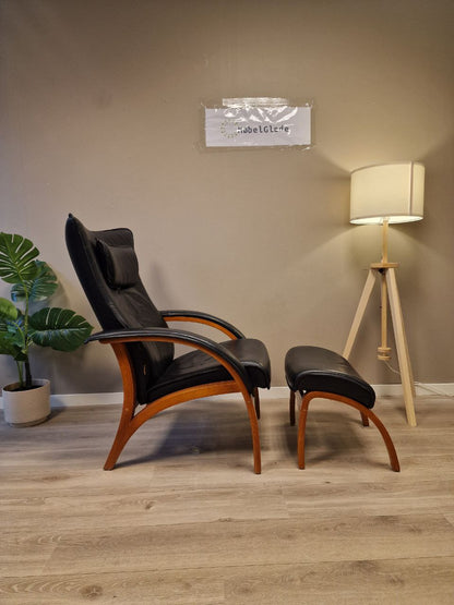 Brukt Brunstad Delta Legend lenestol m/krakk i sort - sidevisning