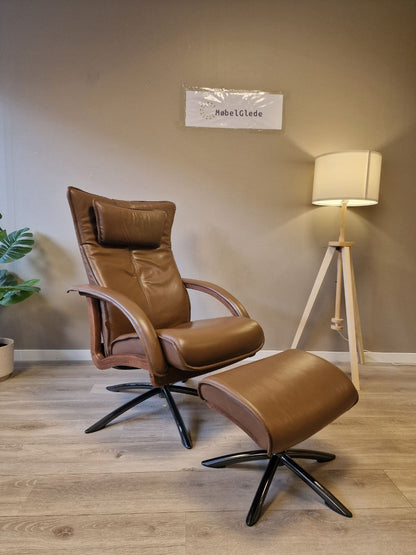 PENT BRUKT | Brunstad Delta Swing lenestol med krakk i mørk brun