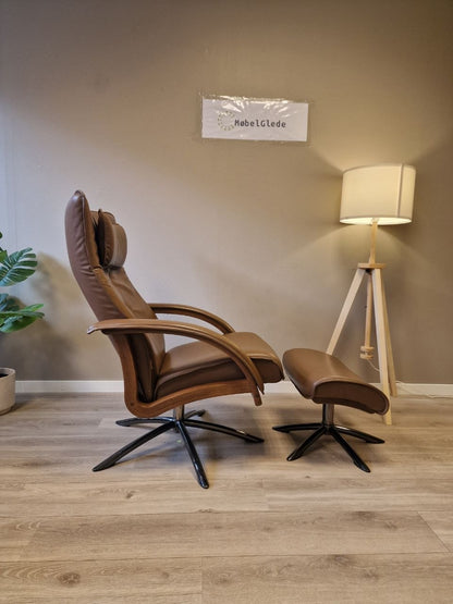 PENT BRUKT | Brunstad Delta Swing lenestol med krakk i mørk brun