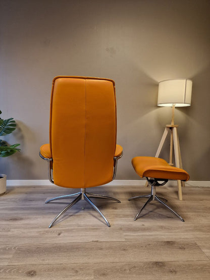 PENT BRUKT | Ekornes Stressless City lenestol med krakk i oransje