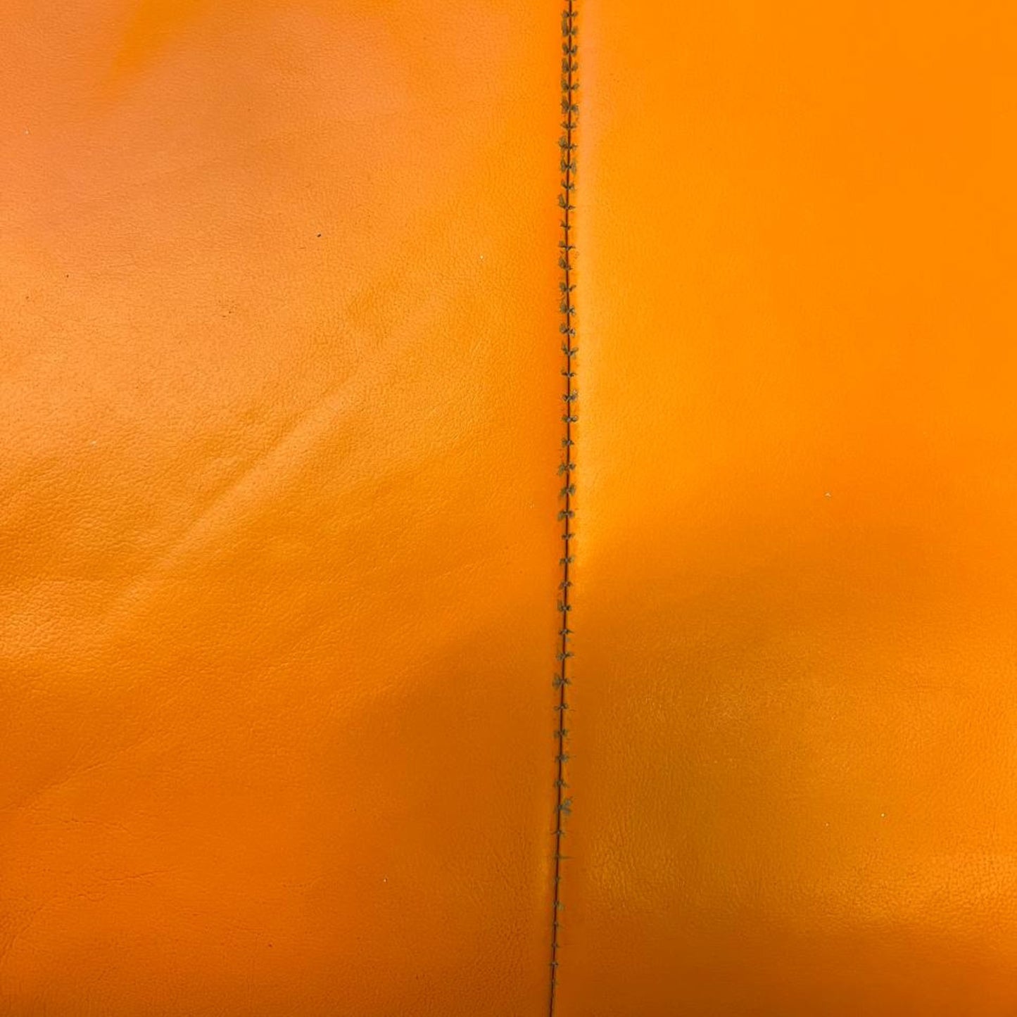 Stressless City Star lenestol med krakk – Oransje skinn | Ekornes | MøbelGlede