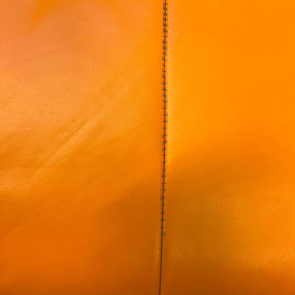 Stressless City Star lenestol med krakk – Oransje skinn | Ekornes | MøbelGlede