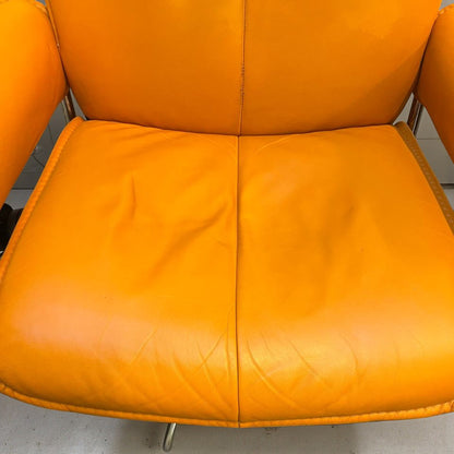 Stressless City Star lenestol med krakk – Oransje skinn | Ekornes | MøbelGlede
