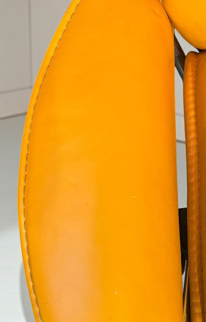 Stressless City Star lenestol med krakk – Oransje skinn | Ekornes | MøbelGlede