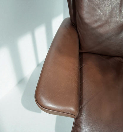 Stressless Magic lenestol (L) i brunt skinn med krakk – Ekornes kvalitet | MøbelGlede