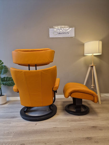 PENT BRUKT | Stressless Magic (M) lenestol med krakk i oransje